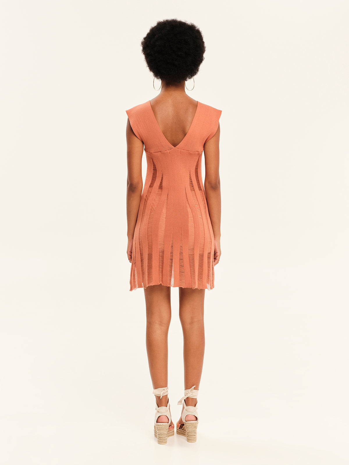 Magic Sunsets Knit V-Neckline Mini Dress