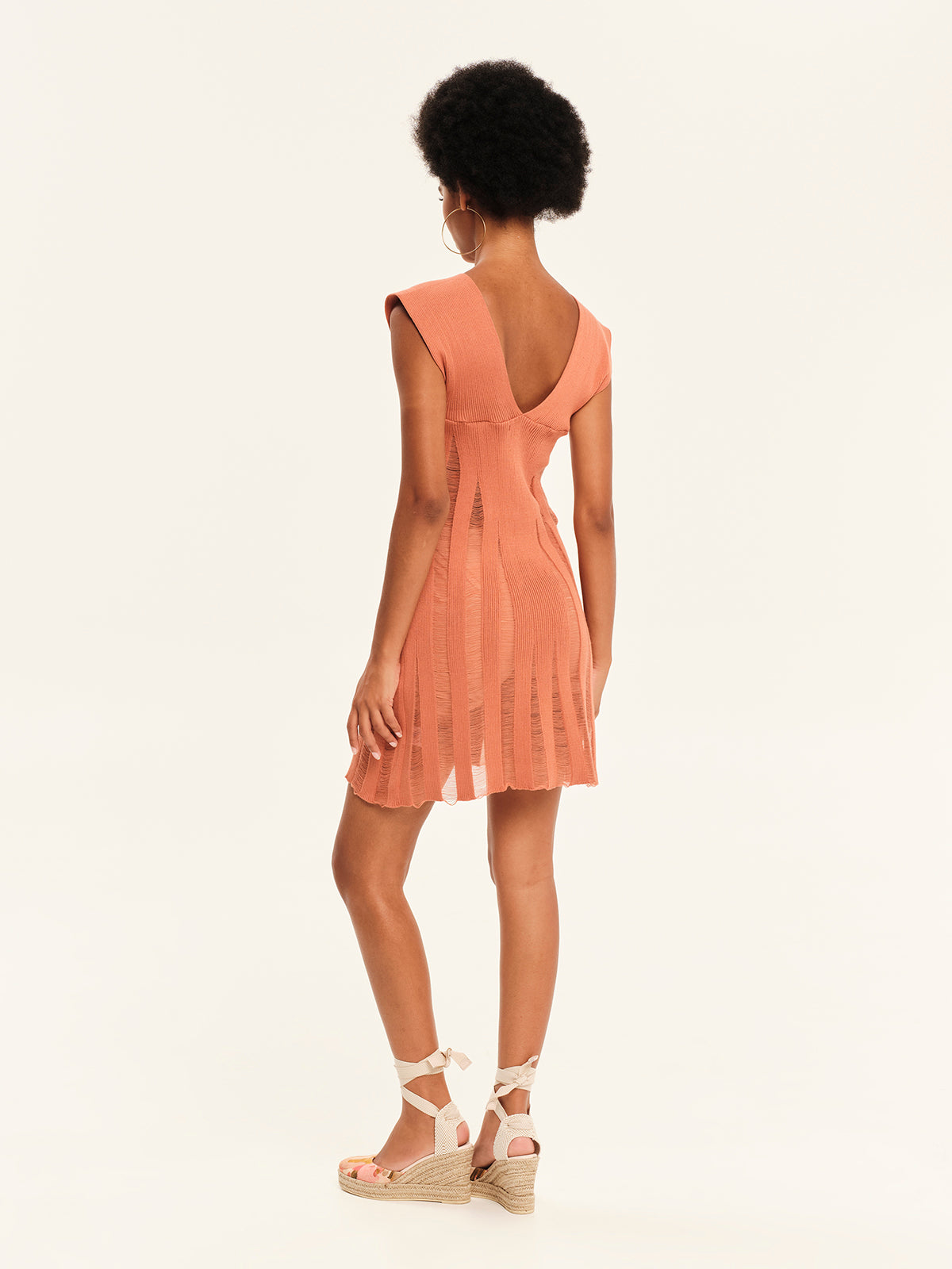 Magic Sunsets Knit V-Neckline Mini Dress